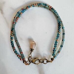 Elegant Beaded Bracelet with Gold Accents